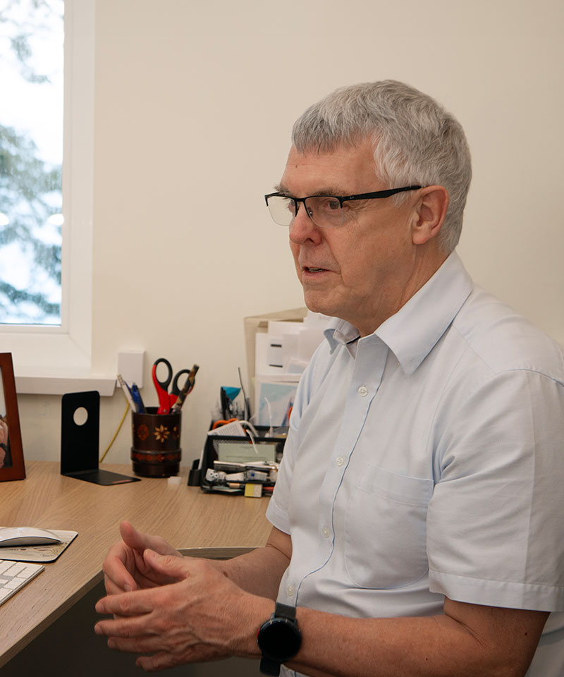 martin at desk mid discussion